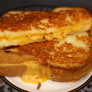 a grilled cheese sandwich on a plate