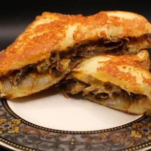 a grilled sandwich on a plate