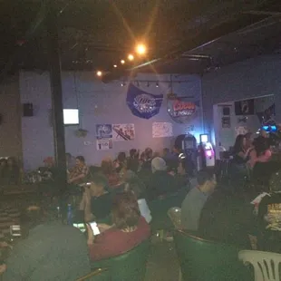 a group of people sitting in a room