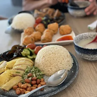 a plate of rice, beans, and vegetables