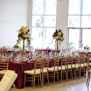 Burgundy and gold old world style  spanish reception .