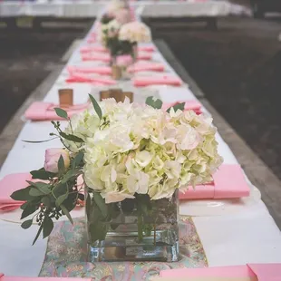Long guest tables in the woods to dine under the stars. Yes, we can make that happen!