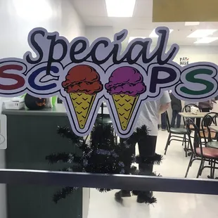 a man standing in front of a window