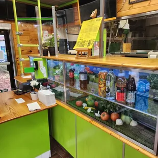 a counter with a variety of food items
