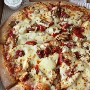 Large pie with chicken breast, fire roasted red peppers, fresh mushrooms for $9.99.