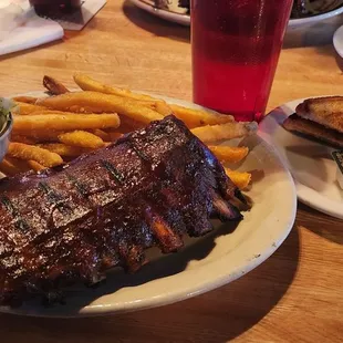 Half rack o' ribs, fries, &amp; cole slaw, with a slice o' toast on the side.