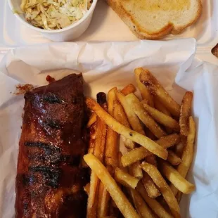 Half rack ribs, fries, cole slaw, toast. Take out.