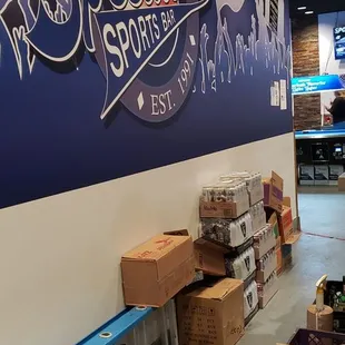 boxes of beer on the floor