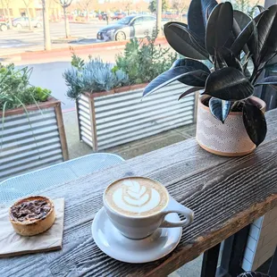 Orange blossom latte with sausage and mushroom quiche