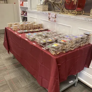 a table with a red tablecloth and a red table cloth