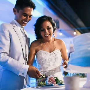 Bride and groom cutting that cake for the first time!  PC: Christie Pham