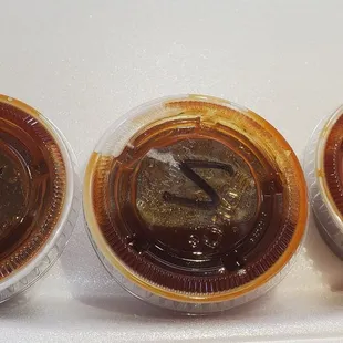 Bbq sauces from left to right. Regular, Spicy, and Extra Spicy.