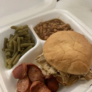 Jumbo pulled chicken sandwich, Hotlink, smoked beans, green beans.