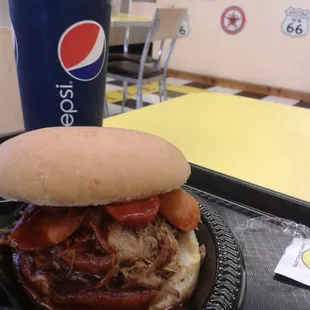 BBQ pork and hot link sandwich with a pepsi, yum!