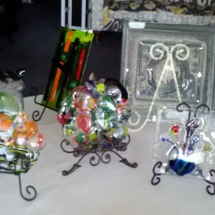 Amazing glass pieces that my picture doesn't do justice. Even large pieces that can be placed in your garden or patio.
