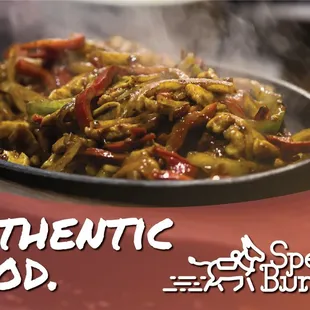 a pan of food with steam rising out of it