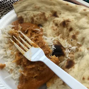 Butter chicken, rice, and naan