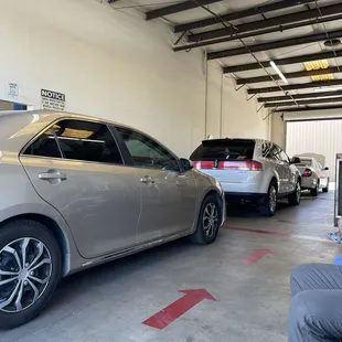 Cars lined up for smog checks.