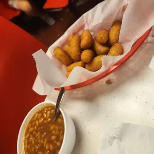 Hush puppies and baked beans.