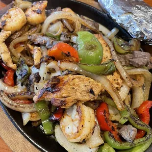 Chicken, Steak, &amp; Shrimp Fajitas
