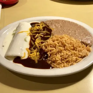 Red &amp; White enchiladas, rice and beans.