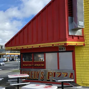 a red and yellow building