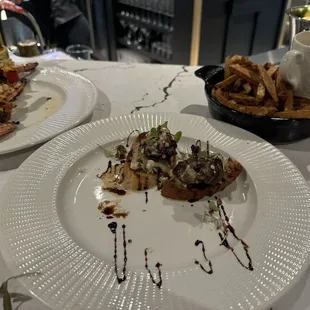 Mango Shrimp Skewer, Prime filet crostini, Rosemary fries with spicy aioli.