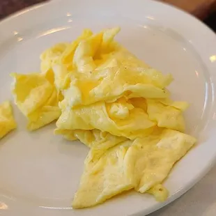 a plate of scrambled eggs