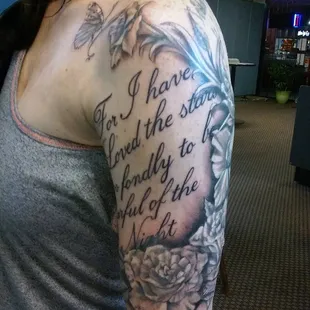 Flowers and saying done by Artist Greg.