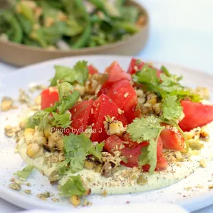 Tomato, grilled corn, pepitas, poblano feta vin ($10) - good though not great