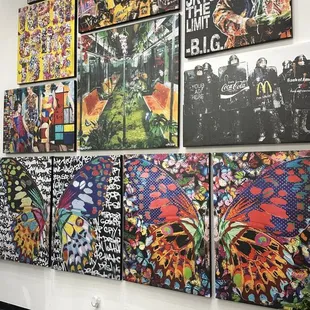 Hand stretched canvas giclées by Spencer Couture all are limited edition works.