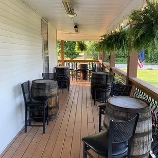porch with chairs and tables