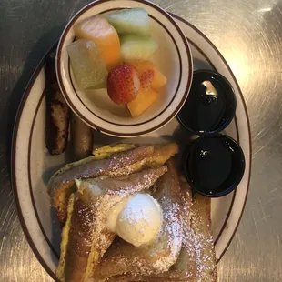 French toast with a bowl of fruit