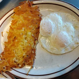 a fried egg and hash browns