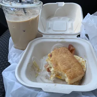Biscuit w/ fried egg, bacon and white cheddar Medium cold latte = $8.97