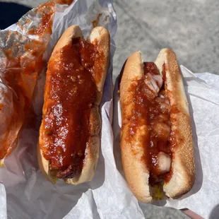 Hot dogs: Chili and mustard (left) Chili, mustard, and onion (right)