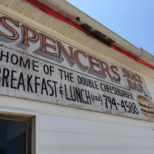 a sign on the side of a building