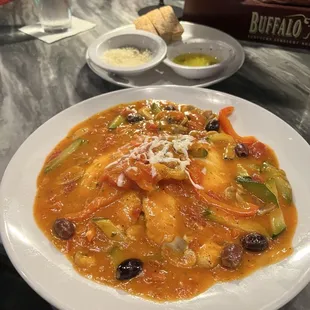 Chicken Cacciatore on a bed of Polenta. Loved the olives. Outstanding!