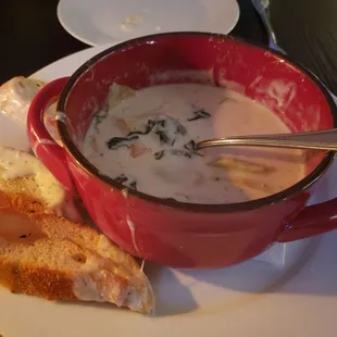 A shrimp, artichoke, and spinach dip with garlic crustini.