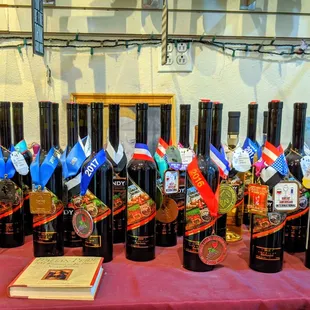 a table full of bottles of wine