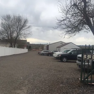 The driveway with the winery at the end of the lane on the right