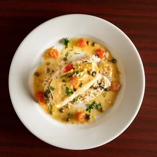 a bowl of chicken and vegetable soup