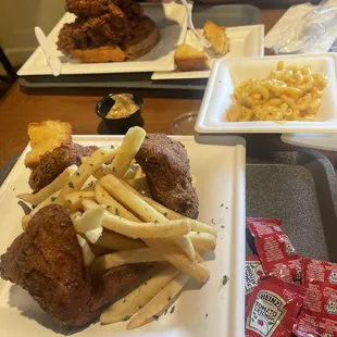 Chicken Jumbo Wings and Fries (bottom) The OC- Orange Chicken and Waffle (top) Mac and Cheese (middle) Cornbread (split between both plates)