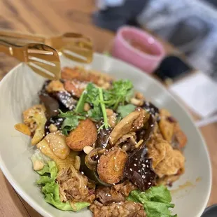 a plate of stir fried vegetables