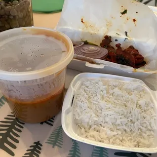 1/2 portion of $12 butter chicken with rice, no rice served with the $13 tandoori