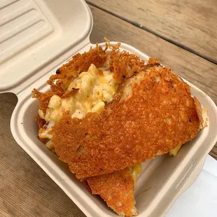 a sandwich in a styrofoam container