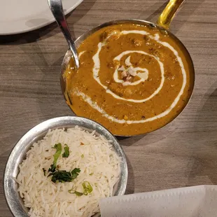Chicken korma with biriyani rice.