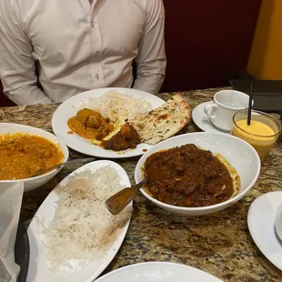 Goat dish, Malai Kofta, Rice, Garlic Naan, and Mango Lassi. Delicious!