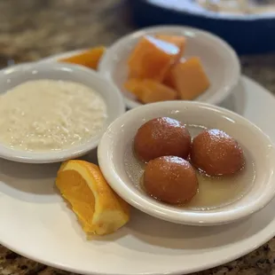 Dessert selection. They cut the oranges perfectly so there isn't the white stuff.