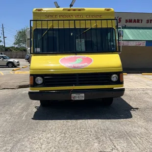 The front of truck with name and logo.